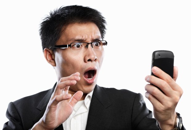 shocked man with phone 6201