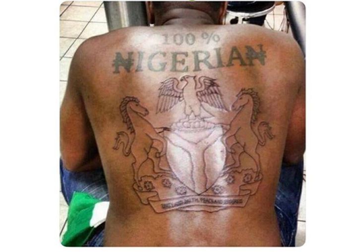 nigerian-coat-of-arms-tattoo-westernfallweddingoutfits